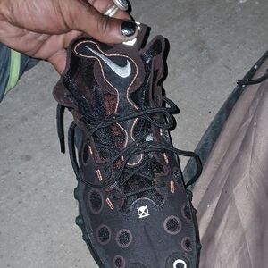 Nike Black and Orange Athletic Shoes with Unique Design